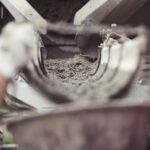 Pouring fresh concrete from mixer